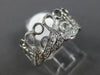 ESTATE .22CT DIAMOND 14KT WHITE GOLD 3D FILIGREE MUSICAL NOTE ETERNITY FUN RING