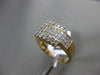 ESTATE WIDE 1.35CT ROUND & PRINCESS CUT DIAMOND 14KT TWO TONE GOLD 3D BELT RING