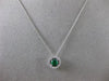 ESTATE .41CT DIAMOND & EMERALD 18KT WHITE GOLD CLASSIC HALO FLOATING PENDANT E/F