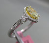 ESTATE .98CT WHITE & FANCY YELLOW DIAMOND 18K GOLD MARQUISE HALO ENGAGEMENT RING