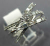 .68CT DIAMOND 14KT WHITE GOLD 3D ROUND & BAGUETTE MULTI ROW CRISS CROSS FUN RING