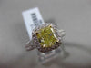 ESTATE 2.26CTW GIA FANCY YELLOW DIAMOND 18KT WHITE GOLD HALO ENGAGEMENT RING