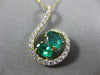 ESTATE LARGE 1.57CT DIAMOND & AAA EMERALD 14KT YELLOW GOLD LOVE FLOATING PENDANT