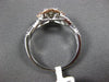 ESTATE .54CT WHITE & PINK DIAMOND 14KT WHITE GOLD 3D CLUSTER INFINITY LOVE RING