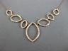 ESTATE LARGE .63CT DIAMOND 14K ROSE GOLD 3D OPEN MARQUISE SHAPE V SHAPE NECKLACE