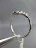 ESTATE .38CT DIAMOND & AAA EMERALD 18KT WHITE GOLD 3D STAR OF DAVID BEZEL RING