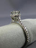 ESTATE .81CT ROUND DIAMOND 18KT WHITE GOLD 4 PRONG HALO CLASSIC ENGAGEMENT RING