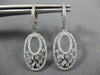 ESTATE .75CT ROUND AND BAGUETTE DIAMOND 14KT WHITE GOLD 3D OVAL HANGING EARRINGS