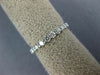 1.03CT DIAMOND 18KT WHITE GOLD 3D ROUND SHARE PRONG ETERNITY ANNIVERSARY RING
