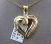 ESTATE LARGE .55CT BAGUETTE DIAMOND 14KT YELLOW GOLD 3D HEART FLOATING PENDANT
