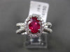 ESTATE 1.45CT DIAMOND & AAA RUBY 18KT WHITE GOLD HALO INFINITY ENGAGEMENT RING