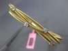 ESTATE .30CT DIAMOND 14KT TWO TONE GOLD 3D CRISS CROSS FLEXIBLE BANGLE BRACELET