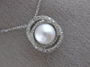 ESTATE .18CT DIAMOND & AAA SOUTH SEA PEARL 14KT WHITE GOLD 3D LOVE KNOT PENDANT