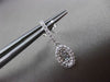 ESTATE .30CT BAGUTTE & ROUND DIAMOND 14KT WHITE GOLD OVAL HANGING EARRINGS