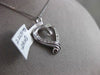 ESTATE .29CT ROUND & BAGUETTE DIAMOND 14K WHITE GOLD FLOATING LOVE HEART PENDANT