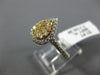 .83CT WHITE & FANCY YELLOW DIAMOND 14KT TWO TONE GOLD PEAR SHAPE HALO LOVE RING