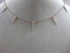 ESTATE .15CT ROUND DIAMOND 14KT ROSE GOLD 3D BY THE YARD SPIKY FLOATING PENDANT