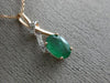 ESTATE .86CT DIAMOND & AAA EMERALD 14KT ROSE GOLD 3D CLASSIC LOVE KNOT PENDANT