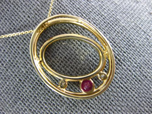 .28CT DIAMOND & AAA RUBY 14KT YELLOW GOLD 3 STONE DOUBLE OVAL LOVE KNOT PENDANT