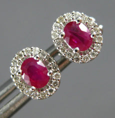 ESTATE .70CT DIAMOND & AAA RUBY 14KT WHITE GOLD CLASSIC OVAL HALO STUD EARRINGS