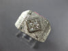 ESTATE LARGE .60CT DIAMOND 18KT WHITE GOLD ROUND & PRINCESS INVISIBLE MENS RING