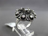 ANTIQUE LARGE 1.14CT DIAMOND 18KT WHITE & BLACK GOLD ETOILE FLOWER FUN RING