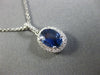 ESTATE 1.21CT DIAMOND & AAA SAPPHIRE 14KT WHITE GOLD OVAL HALO FLOATING PENDANT