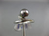 ESTATE .05CT ROUND DIAMOND & AAA TAHITIAN PEARL 18KT WHITE GOLD SWIRL LOVE RING