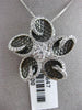 ESTATE LARGE 1.0CT DIAMOND 18KT WHITE & BLACK GOLD FLOWER STAR FLOATING PENDANT