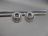 ESTATE .21CT BAGUTTE & ROUND DIAMOND 14K WHITE GOLD OPEN SEA SHELL POST EARRINGS