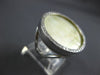 ESTATE LARGE .36CT DIAMOND & MOTHER OF PEARL 14KT WHITE GOLD CIRCLE OF LIFE RING