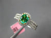 ESTATE .82CT DIAMOND & AAA OVAL CUT EMERALD 18K 2 TONE GOLD HALO ENGAGEMENT RING