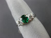 ESTATE 1.02CT DIAMOND & AAA EMERALD 18KT WHITE GOLD BUTTERFLY ENGAGEMENT RING