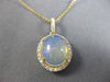 ESTATE 3.73CT DIAMOND & AAA OPAL 14KT YELLOW GOLD 3D CLASSIC OVAL HALO PENDANT