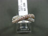 ESTATE 1.08CT DIAMOND 14KT WHITE & ROSE GOLD SEMI ETERNITY X INFINITY LOVE RING