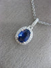 ESTATE 1.21CT DIAMOND & AAA SAPPHIRE 14KT WHITE GOLD OVAL HALO FLOATING PENDANT