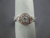 ESTATE .54CT WHITE & PINK DIAMOND 14KT WHITE GOLD 3D CLUSTER INFINITY LOVE RING