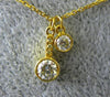 ESTATE .24CT DIAMOND 18KT YELLOW GOLD 3D CLASSIC BEZEL ETOILE FLOATING PENDANT