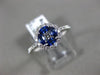 ESTATE .74CT DIAMOND & AAA SAPPHIRE 18KT WHITE GOLD CIRCULAR FLOWER PROMISE RING