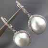 ESTATE .64CT DIAMOND & AAA SOUTH SEA PEARL 18KT WHITE GOLD HALO HANGING EARRINGS