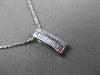 ESTATE .20CT BAGUTTE & ROUND DIAMOND 14K WHITE GOLD RECTANGULAR FLOATING PENDANT