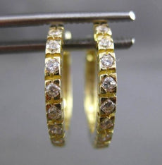 ESTATE CUBIC ZIRCONIA 14KT YELLOW GOLD CLASSIC SEMI BEZEL HUGGIE EARRINGS #24353