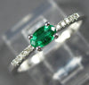 ESTATE .28CT DIAMOND & AAA EMERALD 14KT WHITE GOLD ROUND & OVAL CLASSIC FUN RING