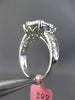 LARGE .85CT ROUND & BAGUETTE DIAMOND 18KT WHITE GOLD 3D CLUSTER ENGAGEMENT RING