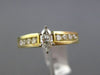 ESTATE 1.09CT ROUND & MARQUISE DIAMOND 14KT YELLOW GOLD FILIGREE ENGAGEMENT RING