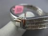 WIDE 6.72CT ROUND & BAGUTTE DIAMOND 18KT WHITE GOLD 3D INFINITY MULTI ROW BANGLE
