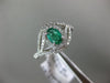 ESTATE WIDE .81CT DIAMOND & AAA EMERALD 14KT WHITE GOLD INFINITY ENGAGEMENT RING