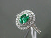 ESTATE WIDE .78CT DIAMOND & EMERALD 18KT WHITE GOLD 3D OVAL HALO ENGAGEMENT RING