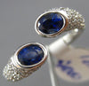 ESTATE 1.72CT DIAMOND & AAA OVAL SAPPHIRE 18KT WHITE GOLD CRISS CROSS LOVE RING