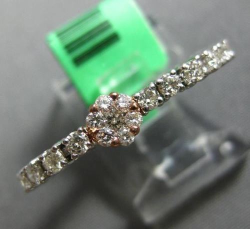 ESTATE .68CT DIAMOND 18KT WHITE & ROSE GOLD FLOWER TENNIS ETERNITY FLEXIBLE RING
